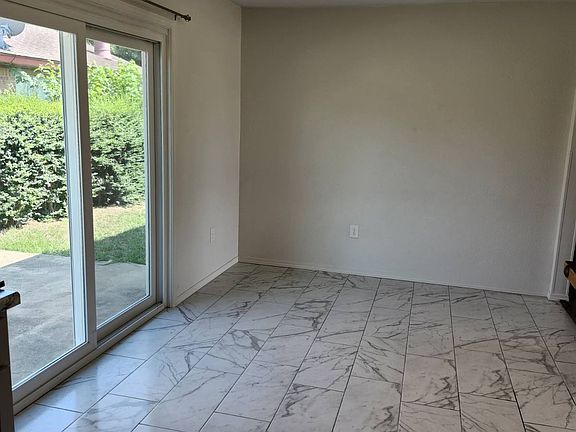 Dining area plus back door to back yard.