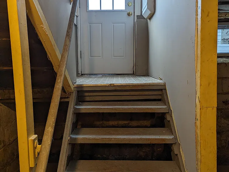 Side Entrance with access to basement and house