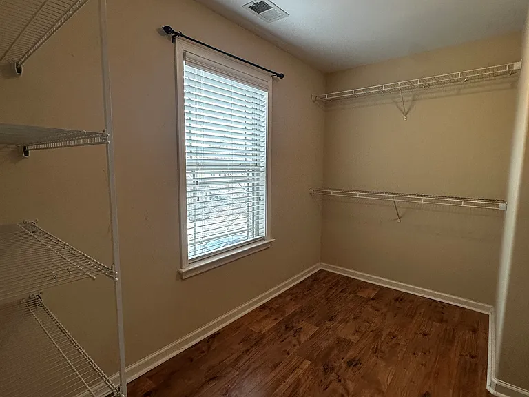 Primary bedroom walking closet