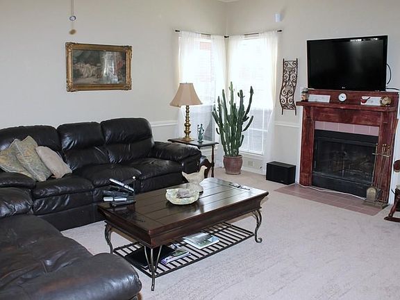 Spacious Den w/cozy fireplace