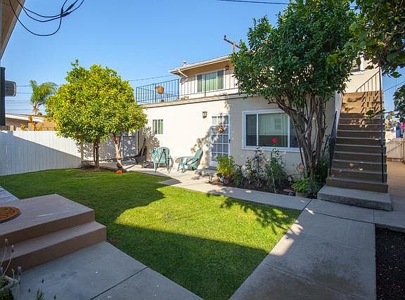 Shared backyard with fruit trees