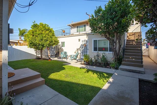 Shared backyard with fruit trees