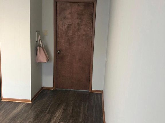 Large bedroom 15 ft x 15 ft approximately. Door leads to living room