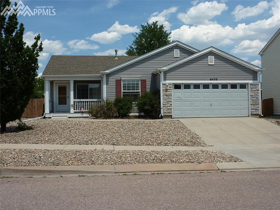 Front of home.  Low maintenance corner lot.