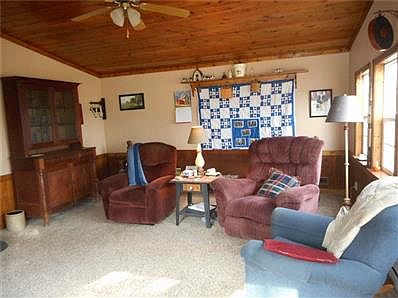 Sunny Family Room with Raised Pine Ceiling!