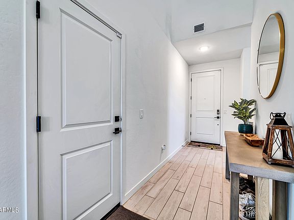 5th image of 15087 W DESERT BLOOM Street