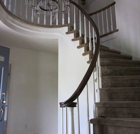 Center hall entry w/ beautiful spiral staircase