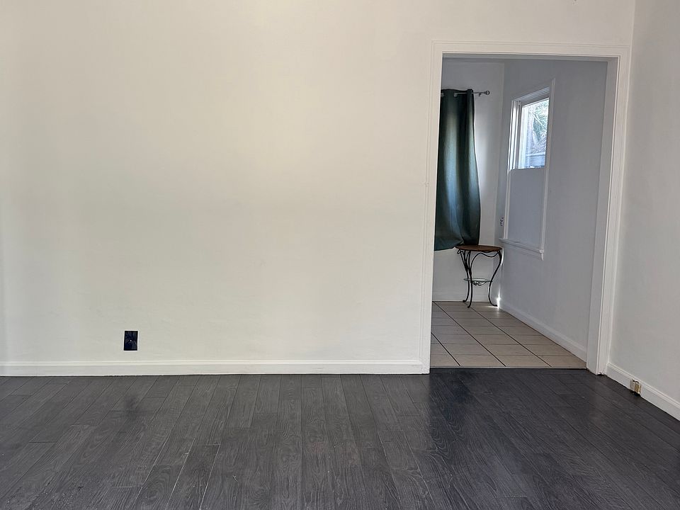 Entrance to the Living Room 
Kitchen in the rear