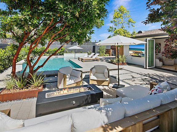 Relaxing shaded poolside seating area