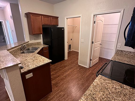 Kitchen, walk in pantry and laundry room.