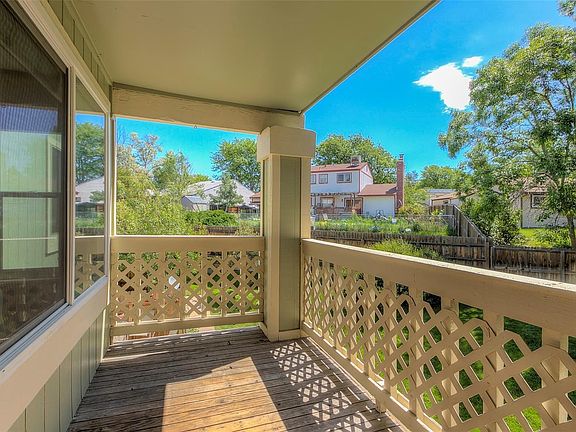 Covered front porch area room for small table and chairs and a grill (electric)