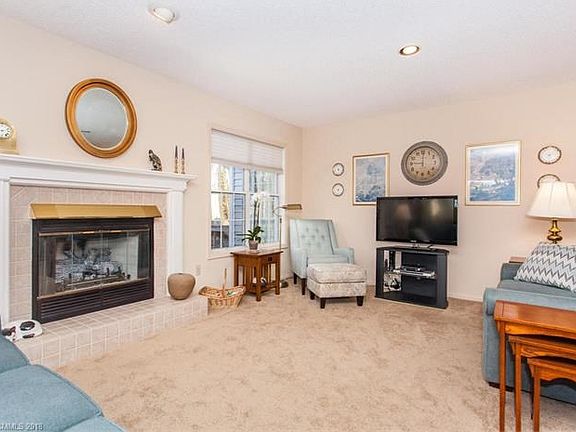 Gas log fireplace in living room