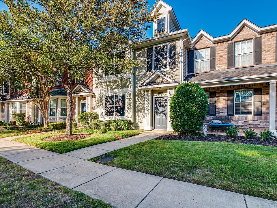 Front of home overlooks private park