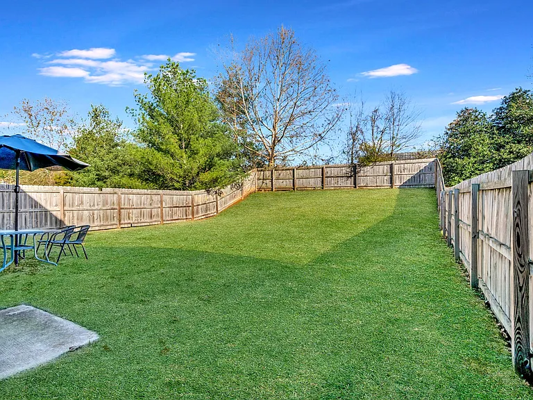 fully fenced in back yard