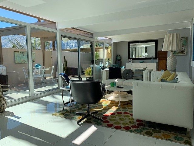 Main living area with floor to ceiling windows