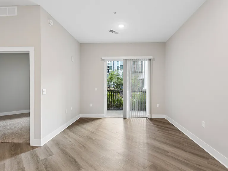 Large living area with patio/balcony.