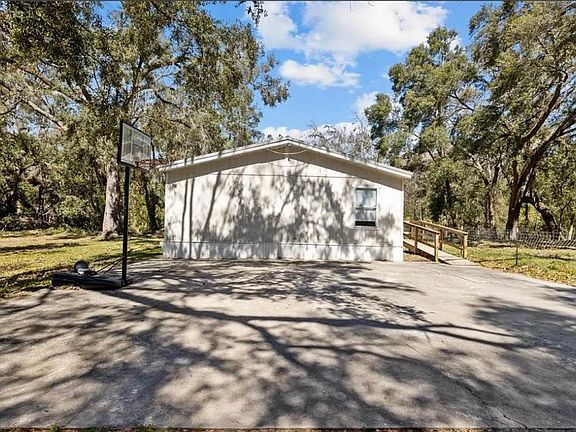 Concrete slab with basketball hoop