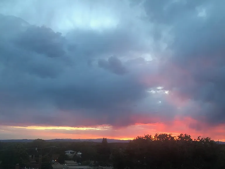 Sunset through upstairs window of 3202 "The Edward" Loft.