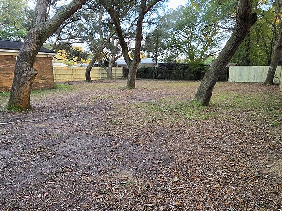 Backyard with new privacy fence