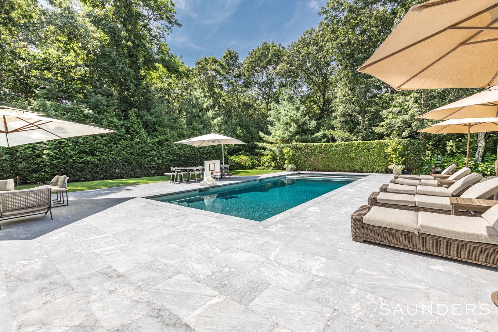  POOL SURROUNDED WITH TRAVERTINE 