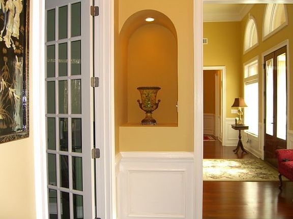 Hallway & foyer leading to Office/den