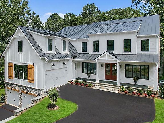 Modern Farmhouse on nearly .5-acre lot- 4-car garage!