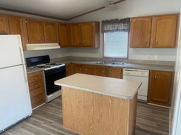 Kitchen With Dishwaser, Gas Stove, Island