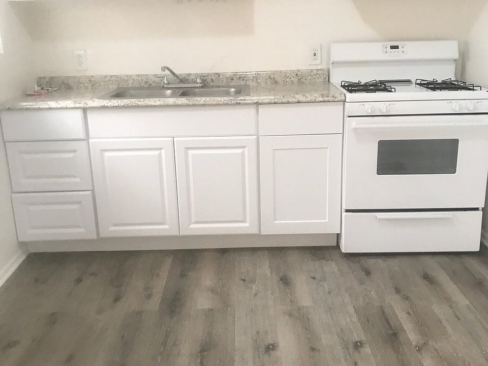 New kitchen cabinets, new flooring and new sink