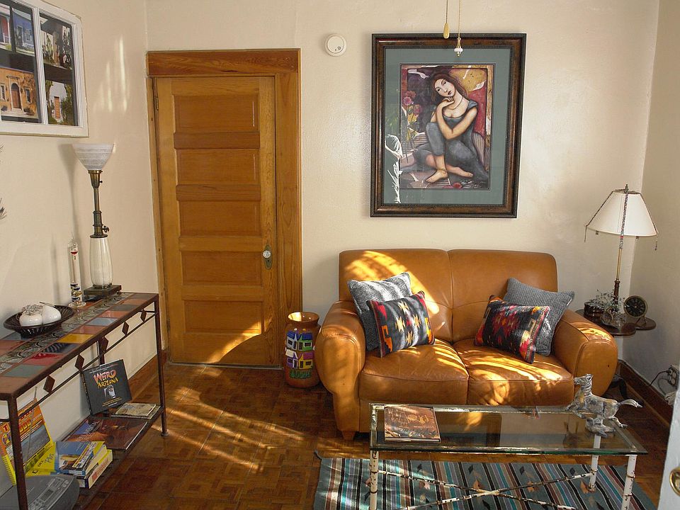 Entrance to Living Room; closed door leads to Kitchen