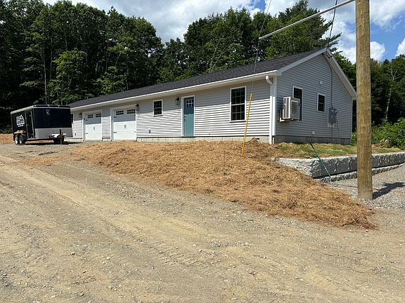 Building 2 with apt 3 and 4. Before paving!