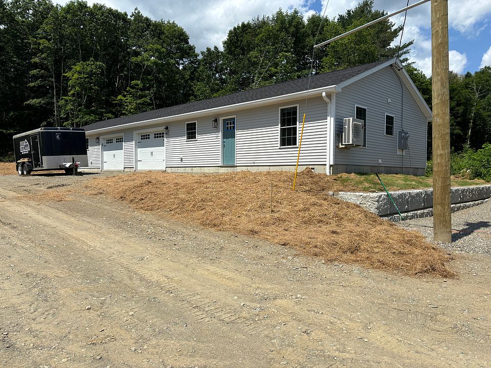 Building 2 with apt 3 and 4. Before paving!
