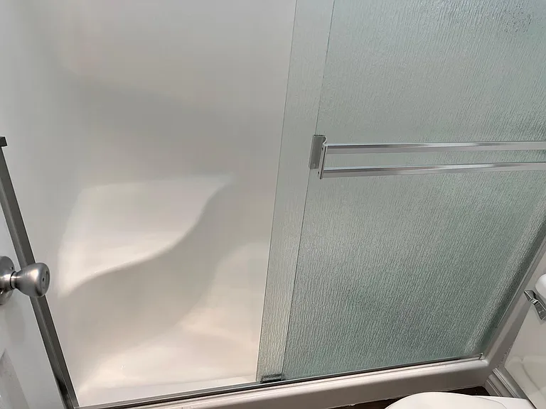 Very clean, walk in showers, new fixtures, seat in shower. Primary bathroom 2x2