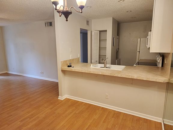 3rd image of 3402 Gardens East Dr APT 18B