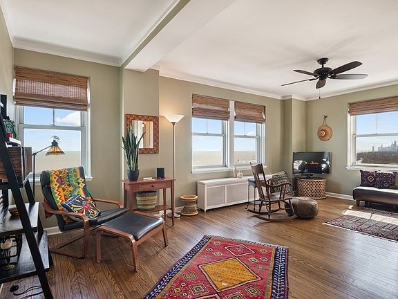 Generous living and dining with unbeatable views of the lake, park and city