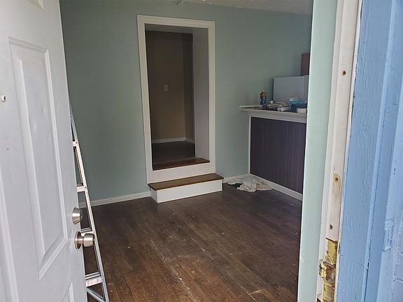 View from 1st entrance into family room (kitchen on right).
