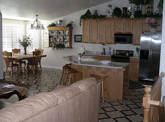 Dining, bay window, kitchen area.