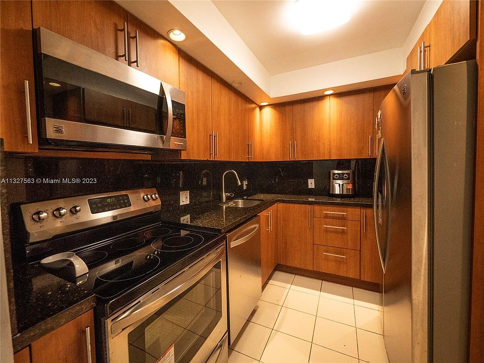 1st image of 3675 N Country Club Dr APT 102