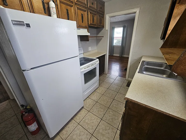 915 Burroughs Rd — Photo 6