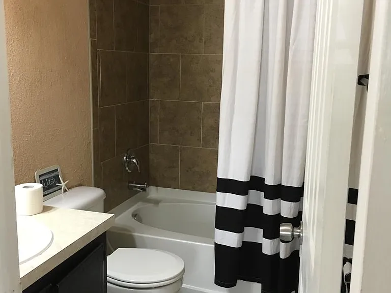 main bathroom with shower and tub