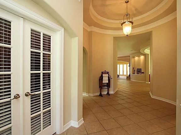 Grand foyer with multi elevations and crown molding!!! Exquisite entry way with impeccable detail to