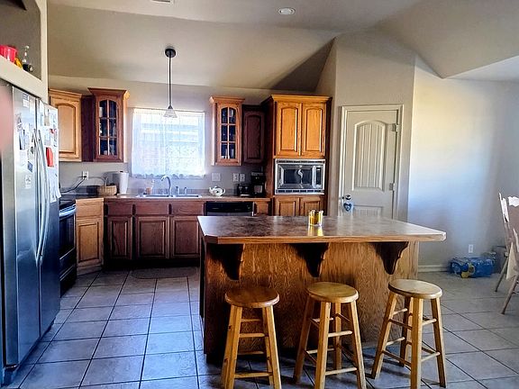 4th image of 10497 E 143rd Ct N