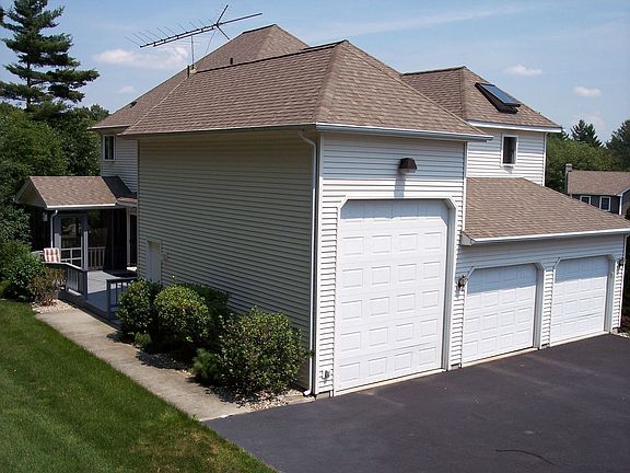 LARGE OVER SIZED GARAGE WITH MANY EXTRAS !!
