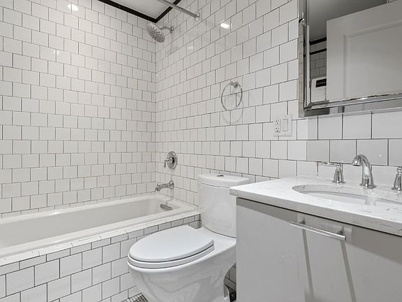 3rd image of 11 E 7th St APT 4E