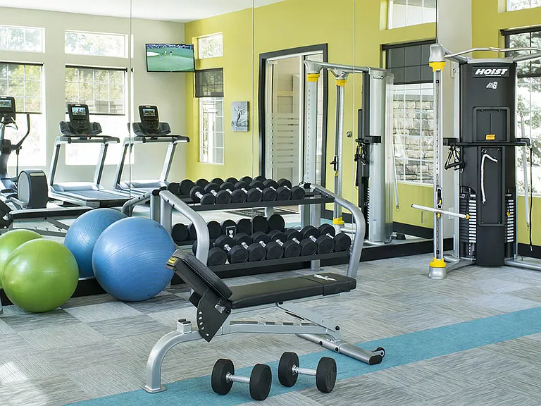 Apartment community 24-hour fitness center at Griffis Belleview Station in Denver, CO.