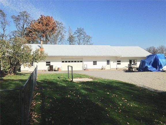 Large 32x82 work garage,cement floor,metal roof