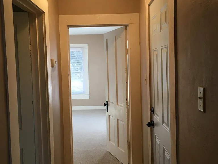 Hall between bedrooms and guest bathroom