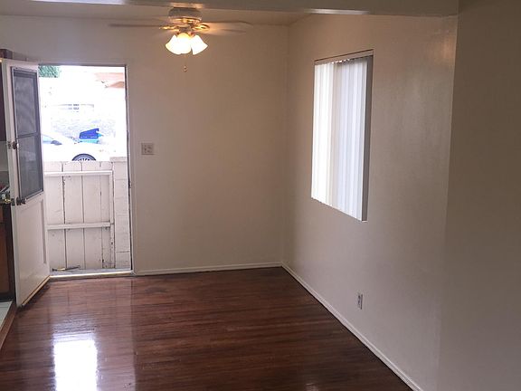 Dining Area with Ceiling Fan and Rear Entry