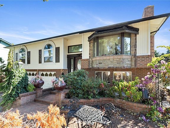 Extensive custom brick work on home exterior and in gardens