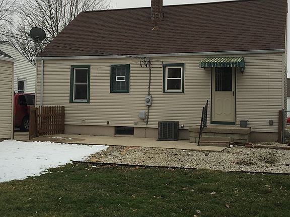 Fenced back yard with patio