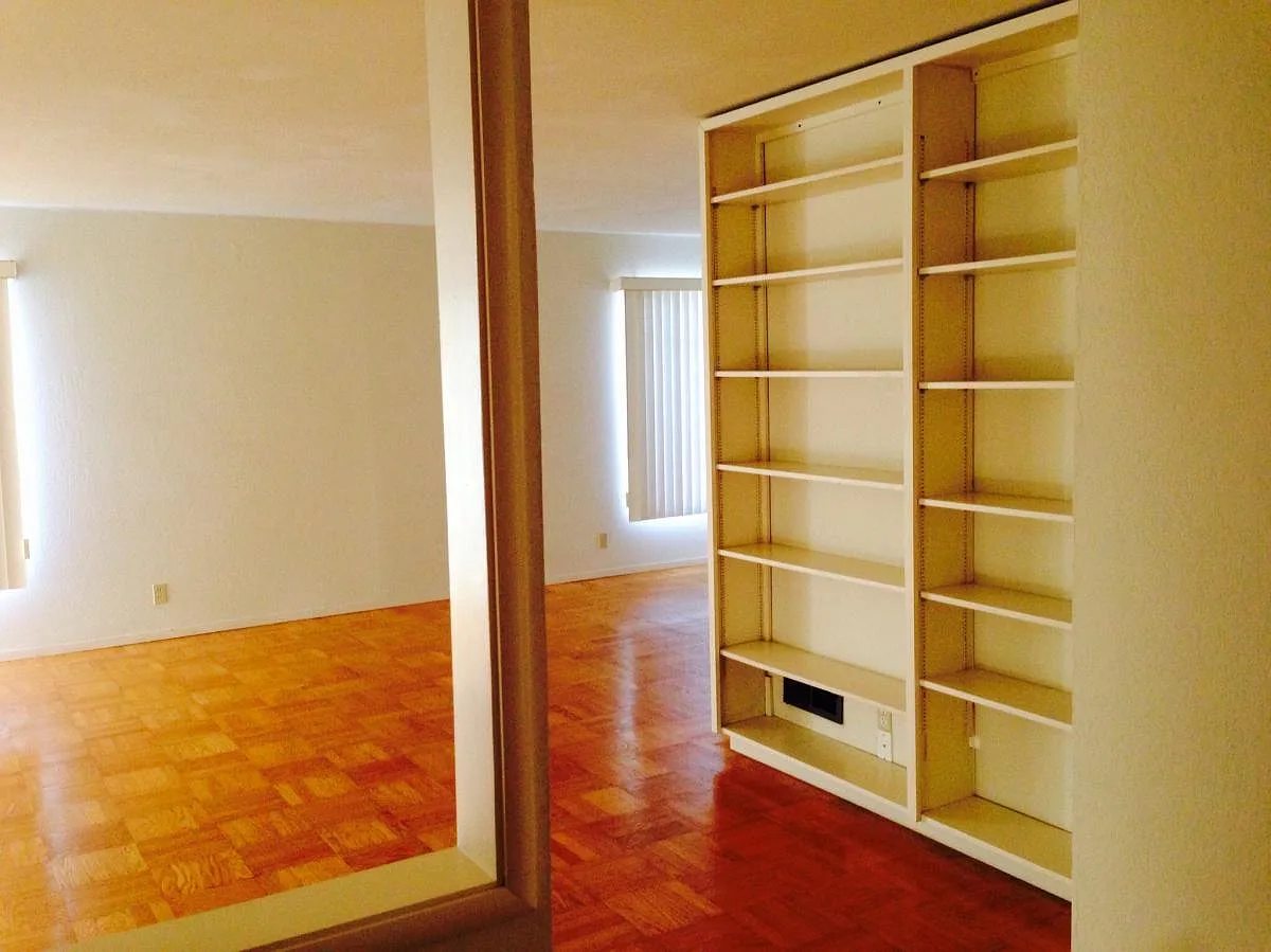 Living room with built in book shelf - 4021 Fairway Ave